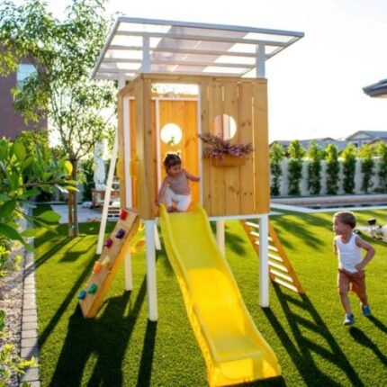 Modern Backyard Outdoor playhouse and Swing Set