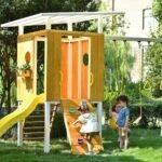 Modern Backyard Outdoor playhouse and Swing Set
